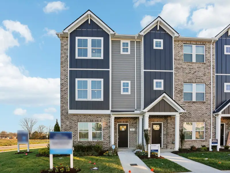 Front exterior of a home in the Greystone - Highland Townhomes community, located in Smyrna, TN (Image 3).