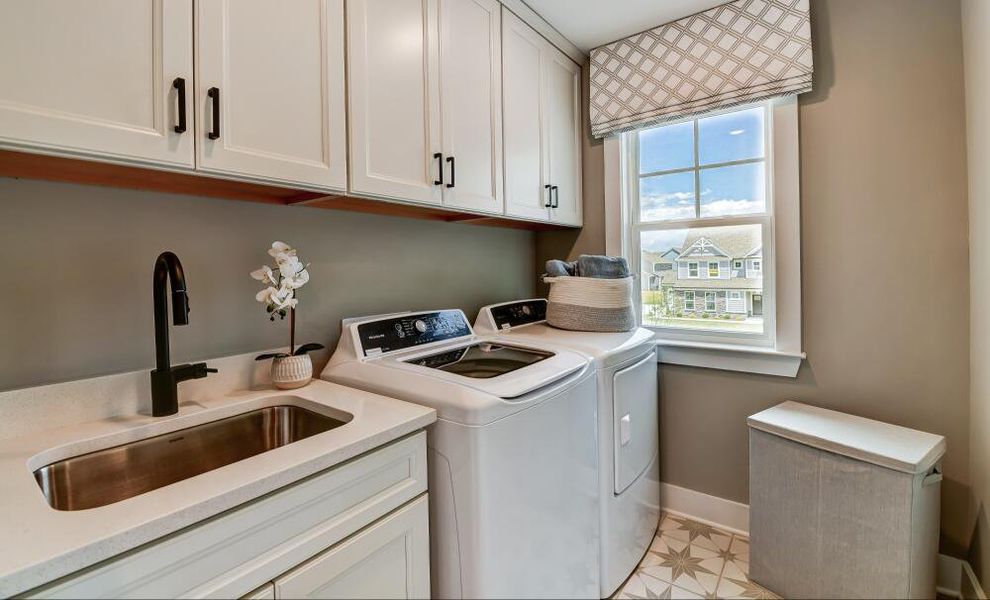 Furnished interior in a model home at Twin Creek Forsyth in Kernersville (Image 39).