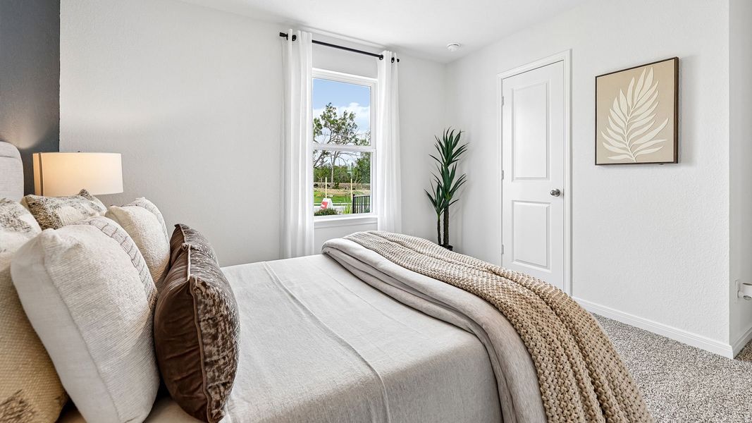 Furnished interior in a model home at Revelry in Del Valle (Image 37). Furnished interior in a model home at Revelry in Del Valle (Image 37).
