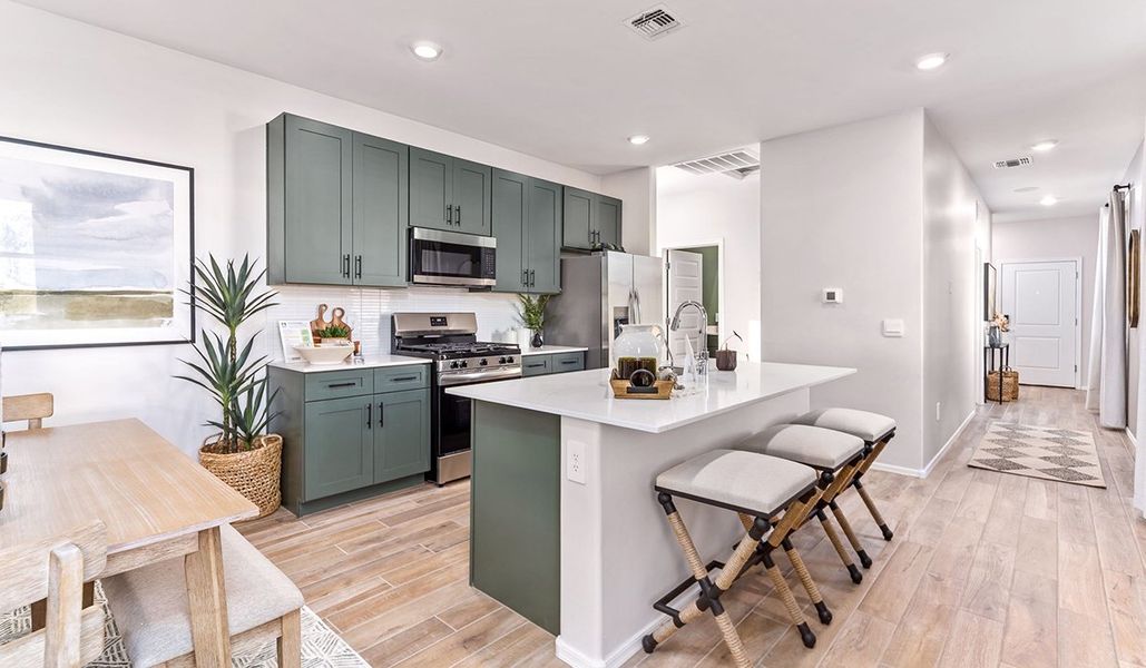 Furnished interior in a model home at Coronet at Gladden Farms in Marana (Image 10).
