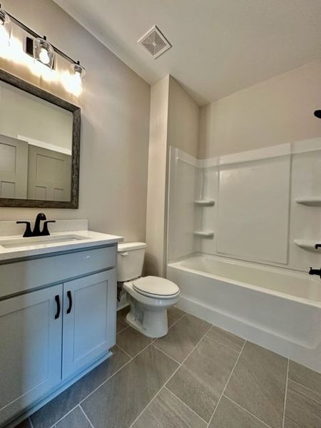 Furnished interior in a model home at Triple Park in Moreland (Image 3).