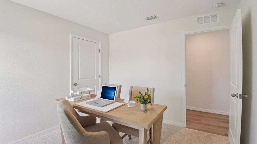 Furnished interior in a model home at Brighton Park in Hudson (Image 25).
