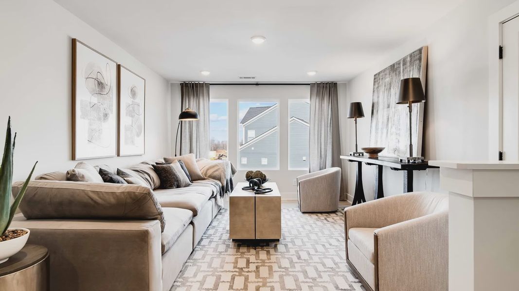 Sophisticated Richvale Estates living room boasting modern furnishings, ample natural light, and tasteful decor.