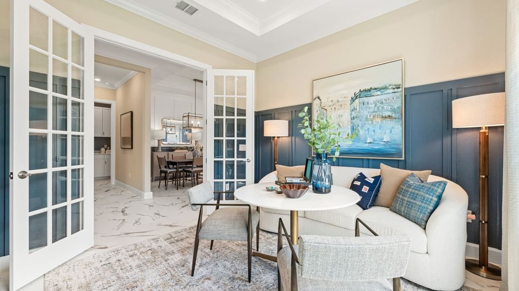 Furnished interior in a model home at Esplanade at Coasterra in Palmetto (Image 10).