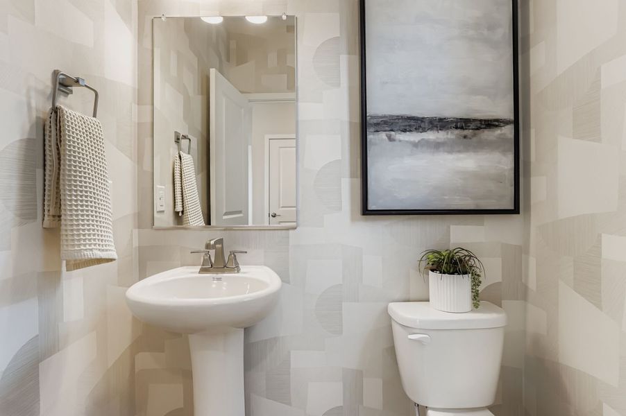 Furnished interior in a model home at Barefoot in Firestone (Image 9).