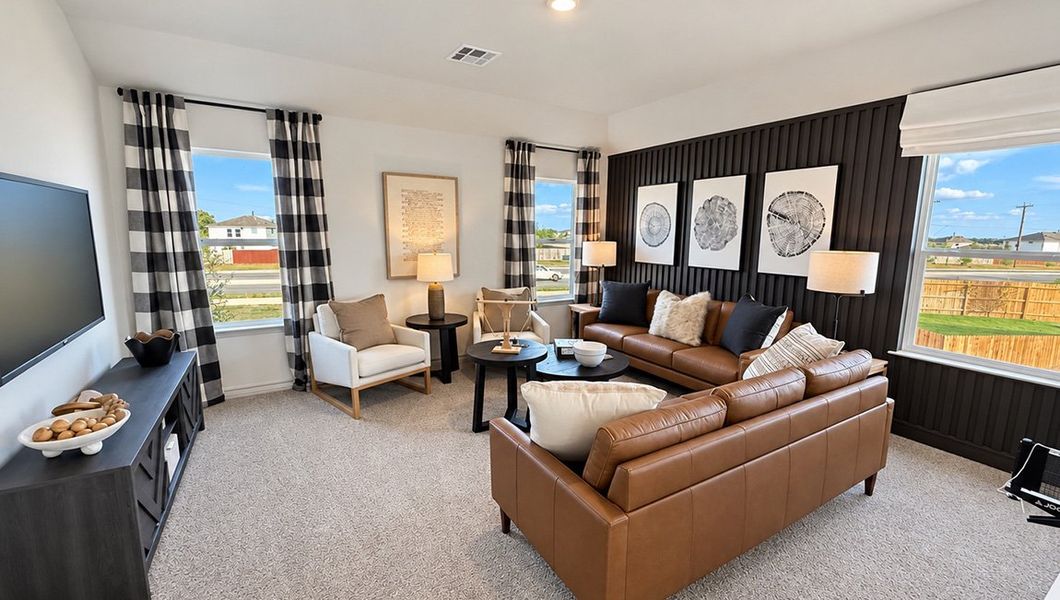Furnished interior in a model home at Redbird Ranch in San Antonio (Image 46).
