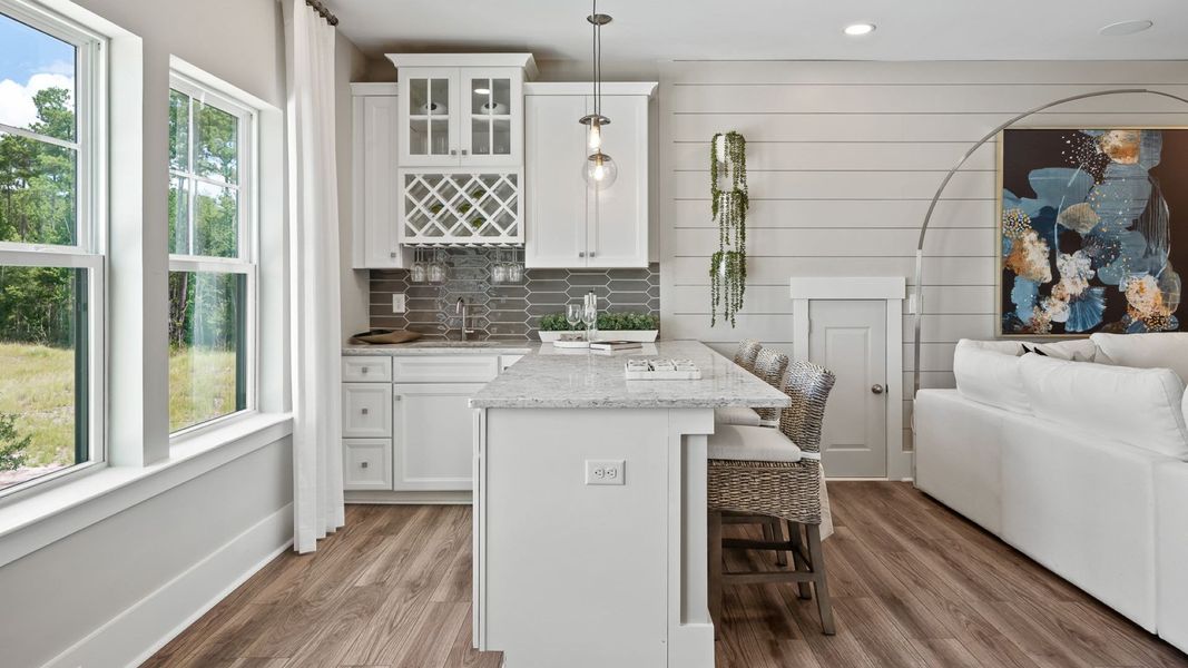Furnished interior in a model home at Ocean Isle Palms in Shallotte (Image 14).