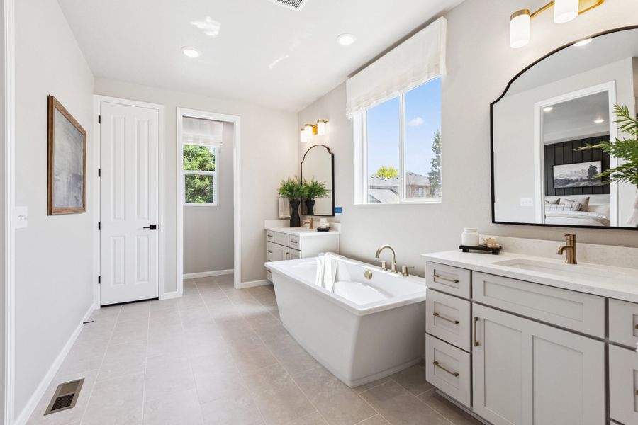 Furnished interior in a model home at Highlands Preserve in Mead (Image 20).