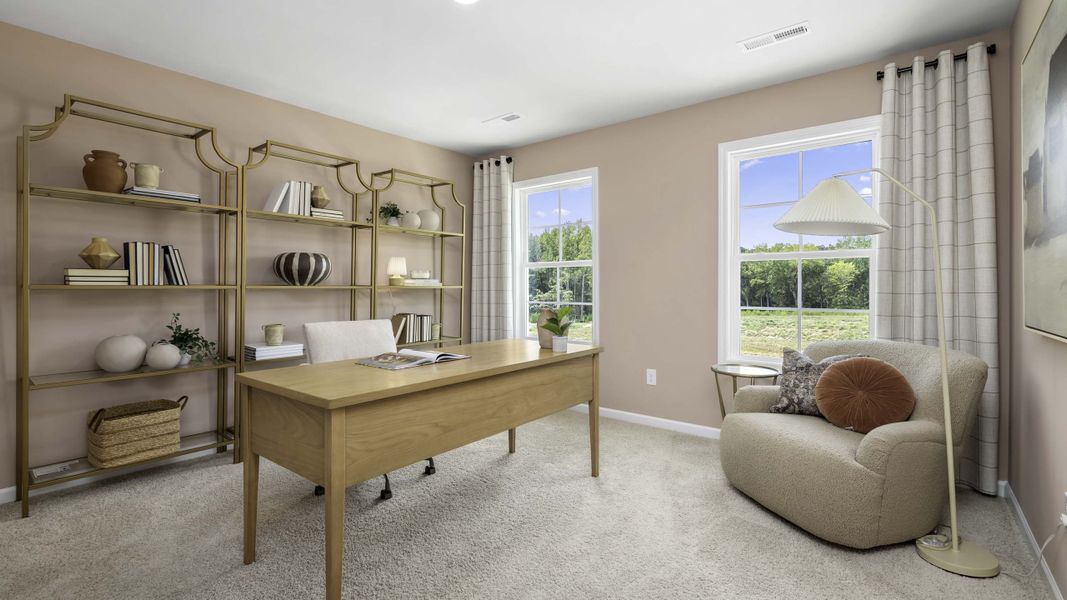 Furnished interior in a model home at The Meadows at Kinsley in Jamestown (Image 22).