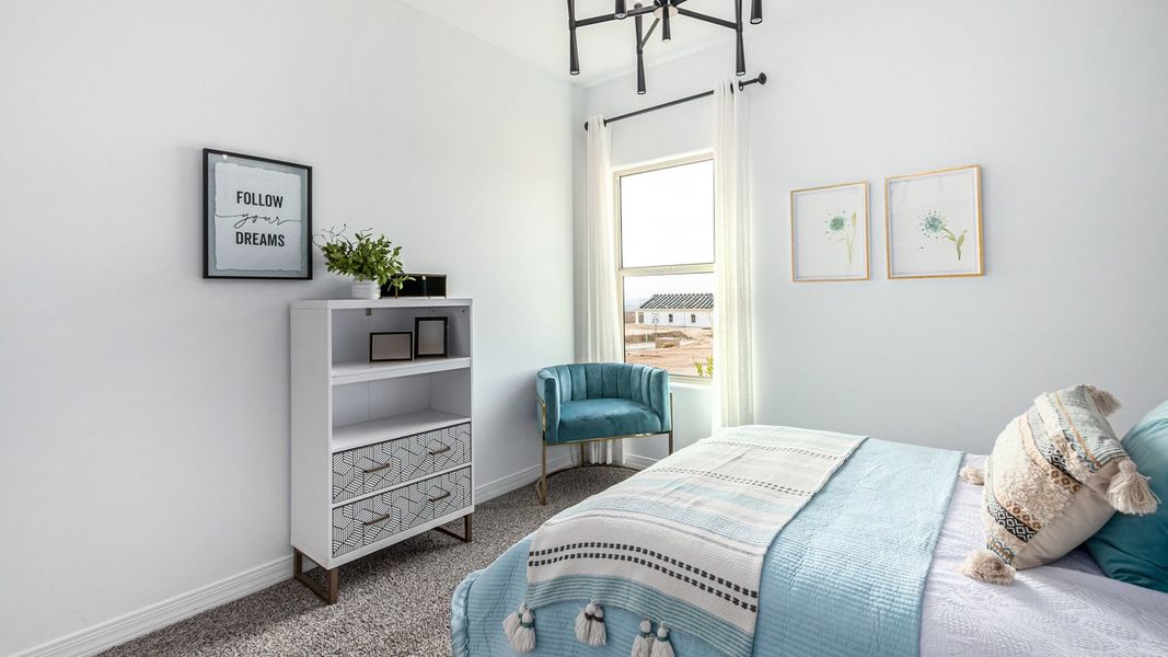 Furnished interior in a model home at Entrada Del Toro at Rancho Sahuarita in Sahuarita (Image 36).