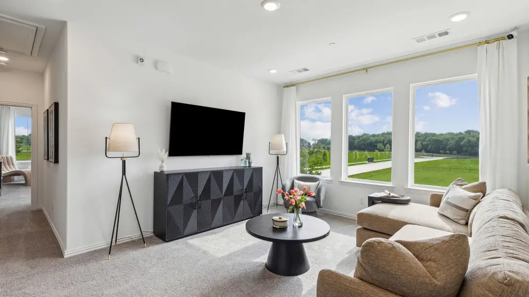 Furnished interior in a model home at Painted Tree – Woodland District in McKinney (Image 31).