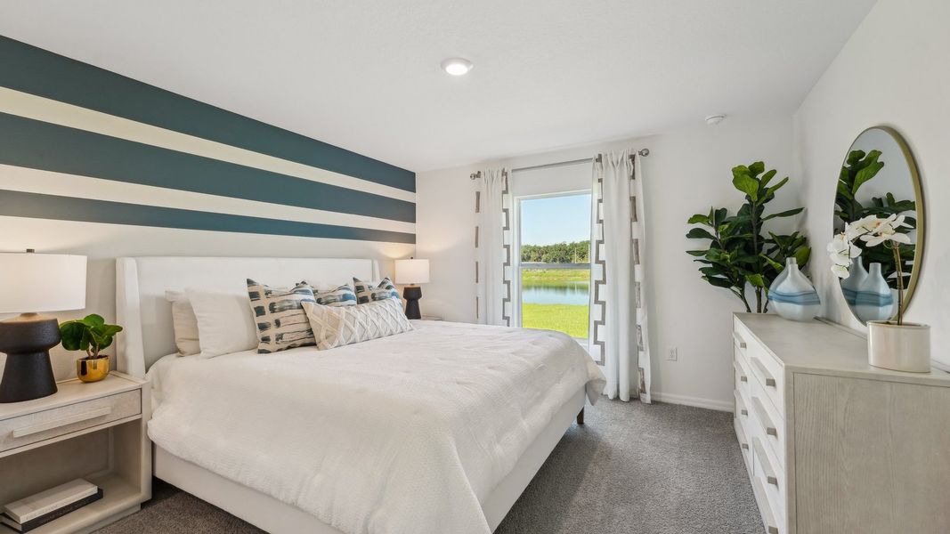 Furnished interior in a model home at Sunset Hills in Summerfield (Image 23).