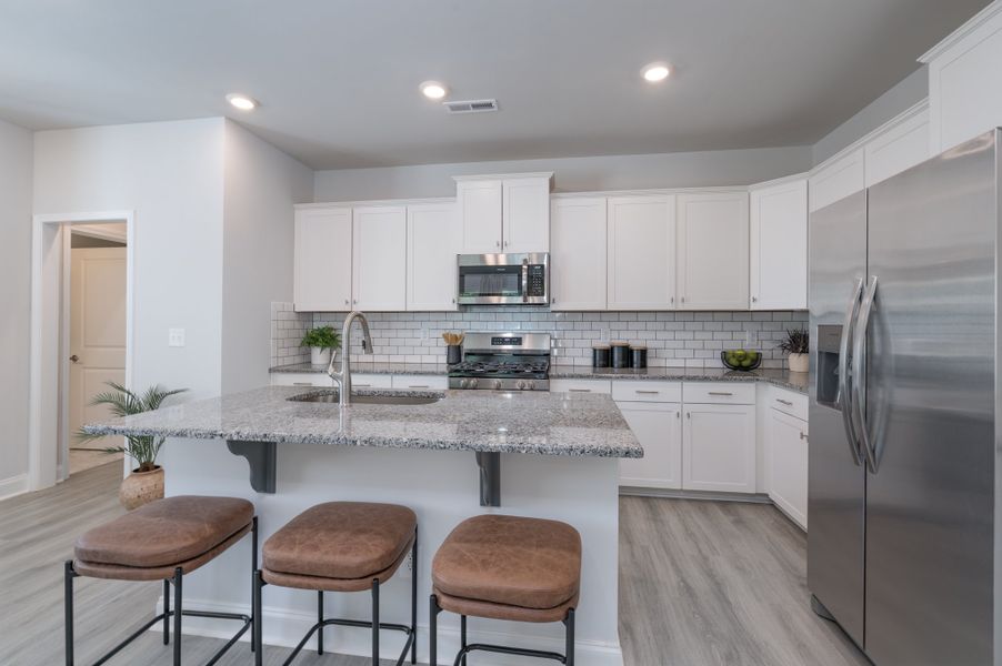 Furnished interior in a model home at Pine Trace in Gastonia (Image 5).