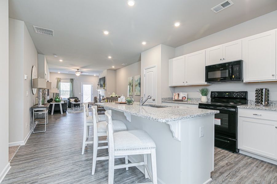 Furnished interior in a model home at The Cottages of Silvertown in Thomaston (Image 32).