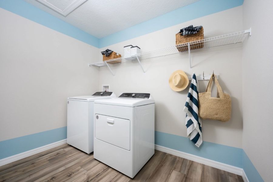 Furnished interior in a model home at Davis Landing in Wimauma (Image 10).