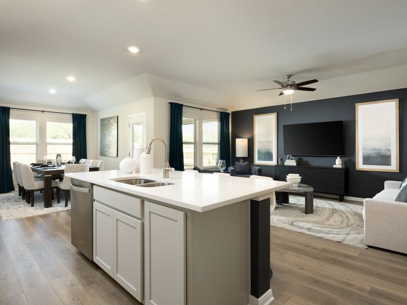 Living, dining room, and kitchen in the Callaghan floorplan at a Meritage Homes community. Living, dining room, and kitchen in the Callaghan floorplan at a Meritage Homes community.