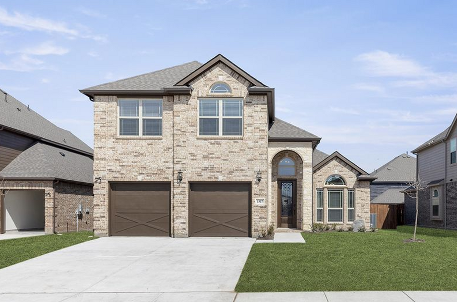 Front exterior of a home in the Dove Chase community, located in Mansfield, TX (Image 3).