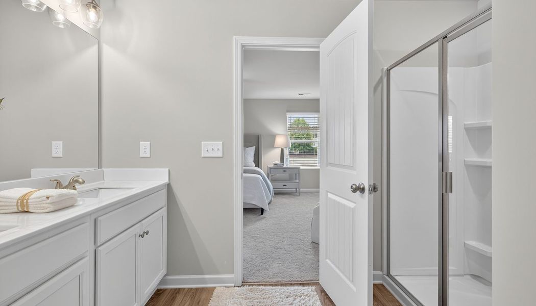 Furnished interior in a model home at The Reserve at Clocktower in Douglasville (Image 25).