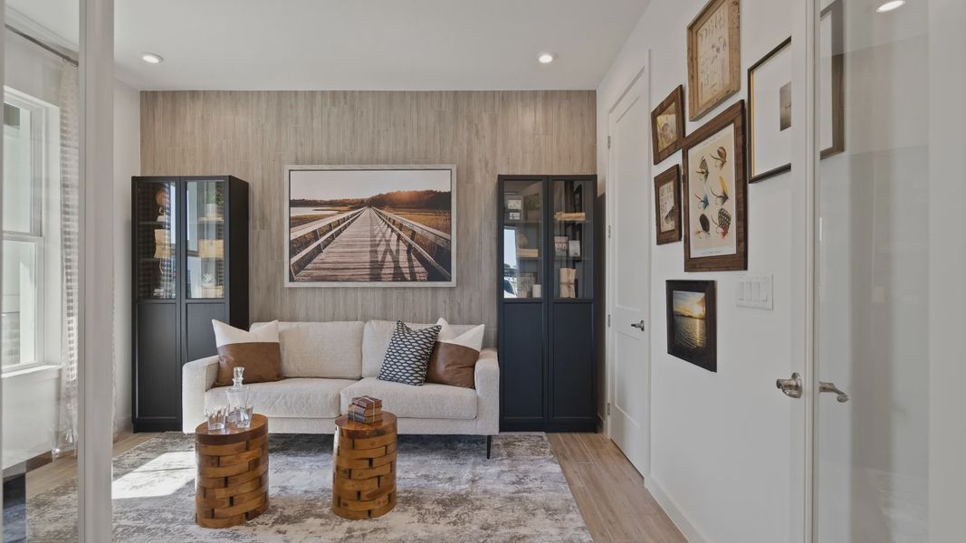 Utilize the flex space as a private office or a cozy living room.