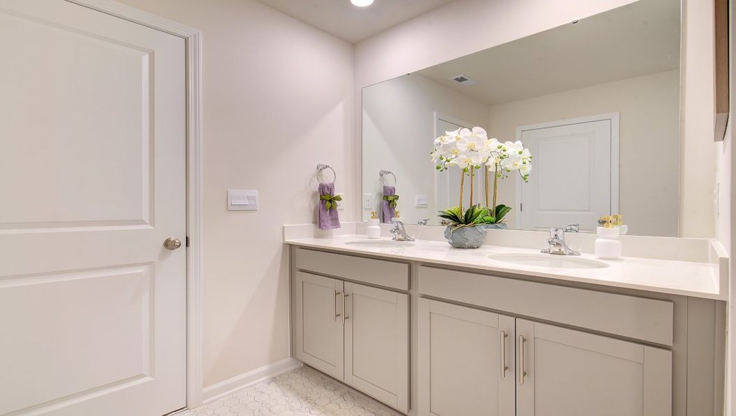 Furnished interior in a model home at Wildbrook Village in Waynesville (Image 6).