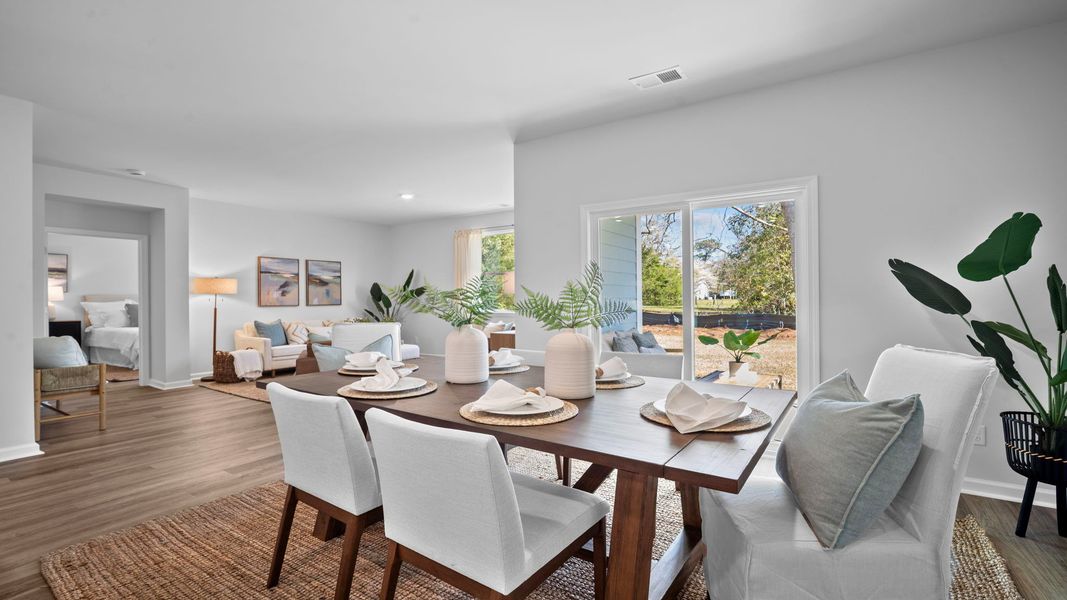 Furnished interior in a model home at Fernhill Farms in Statesboro (Image 9).