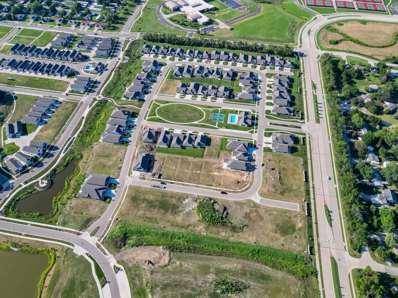 Aerial view of the The Courtyards at The Heritage community in Andover, KS, showing layout and nearby surroundings (Image 13). Aerial view of the The Courtyards at The Heritage community in Andover, KS, showing layout and nearby surroundings (Image 13).