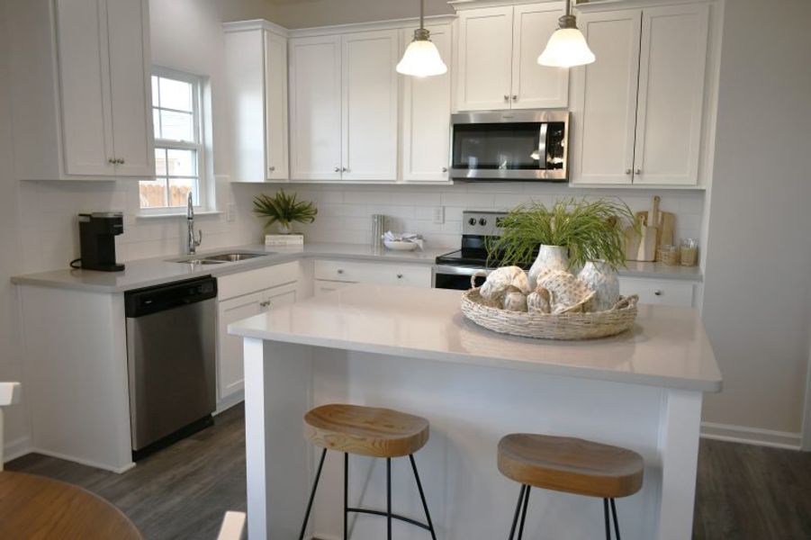 Furnished interior in a model home at Brassfield Meadows in Burlington (Image 44).