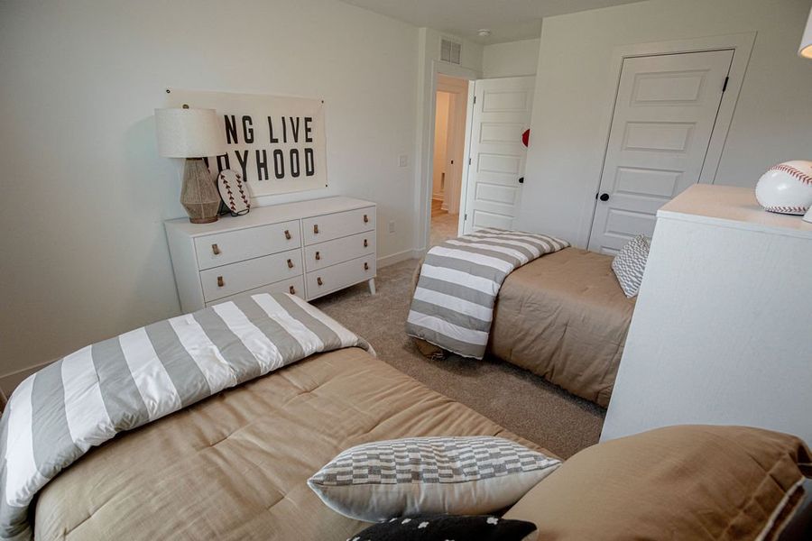 Furnished interior in a model home at The Townhomes at Union Depot in Bartlett (Image 32).