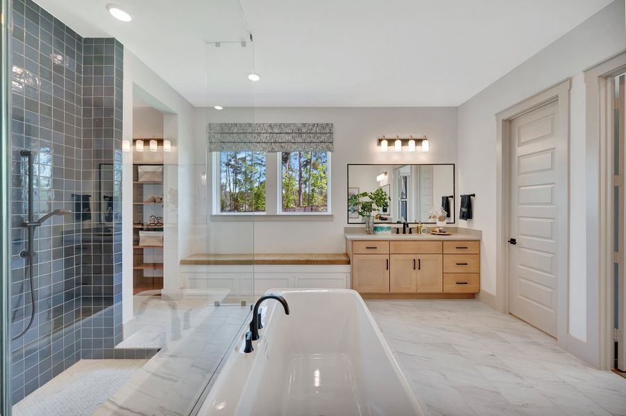 Furnished interior in a model home at The Woodlands Hills - Premier Collection in Willis (Image 22).