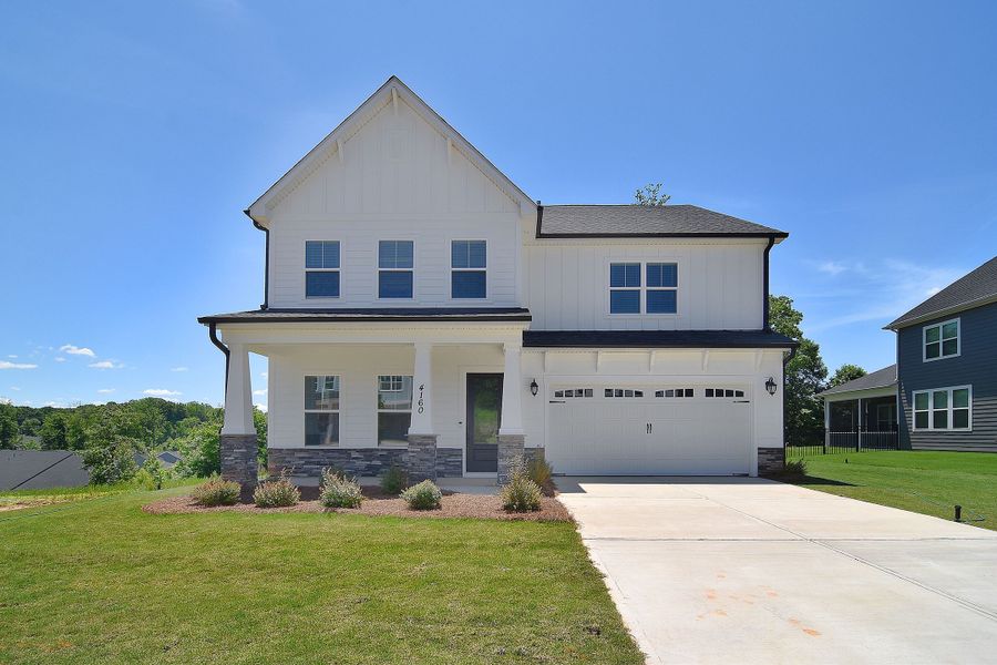 Front exterior of a home in the Wildbrook community, located in Denver, NC (Image 5). Front exterior of a home in the Wildbrook community, located in Denver, NC (Image 5).