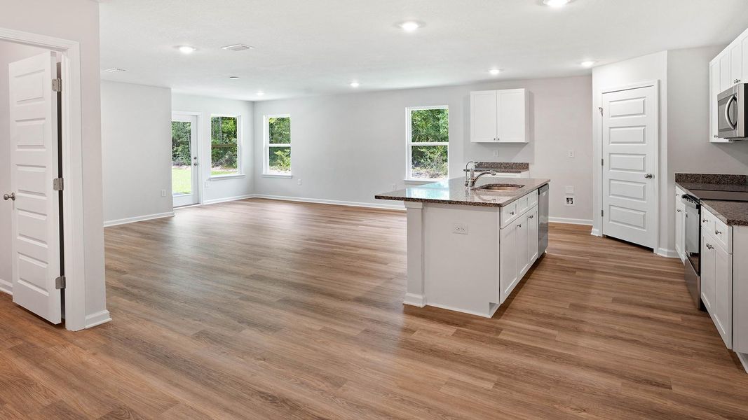 Furnished interior in a model home at Sunny Hills in Chipley (Image 7).