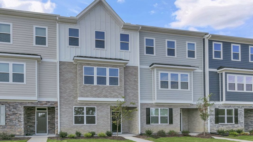 Front exterior of a home in the The Townes at Madden West community, located in Fuquay Varina, NC (Image 5).