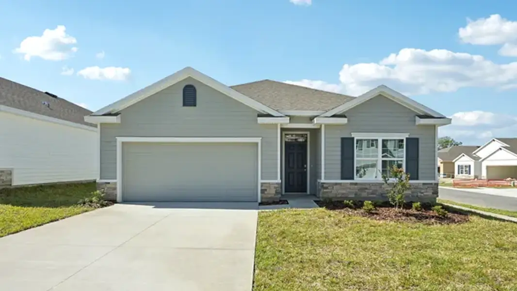 Front exterior of a home in the Tara Verde community, located in Newberry, FL (Image 1). Front exterior of a home in the Tara Verde community, located in Newberry, FL (Image 1).