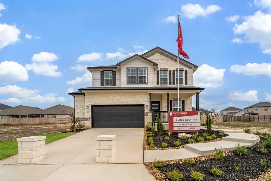 Front exterior of a home in the Cloud Country community, located in New Braunfels, TX (Image 2). Front exterior of a home in the Cloud Country community, located in New Braunfels, TX (Image 2).
