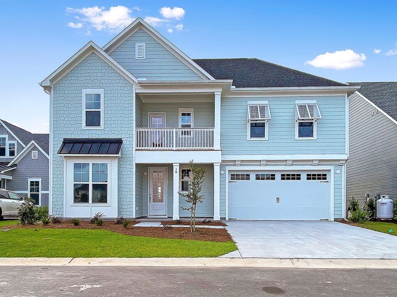 Front exterior of a home in the WyndWater community, located in Hampstead, NC (Image 4).