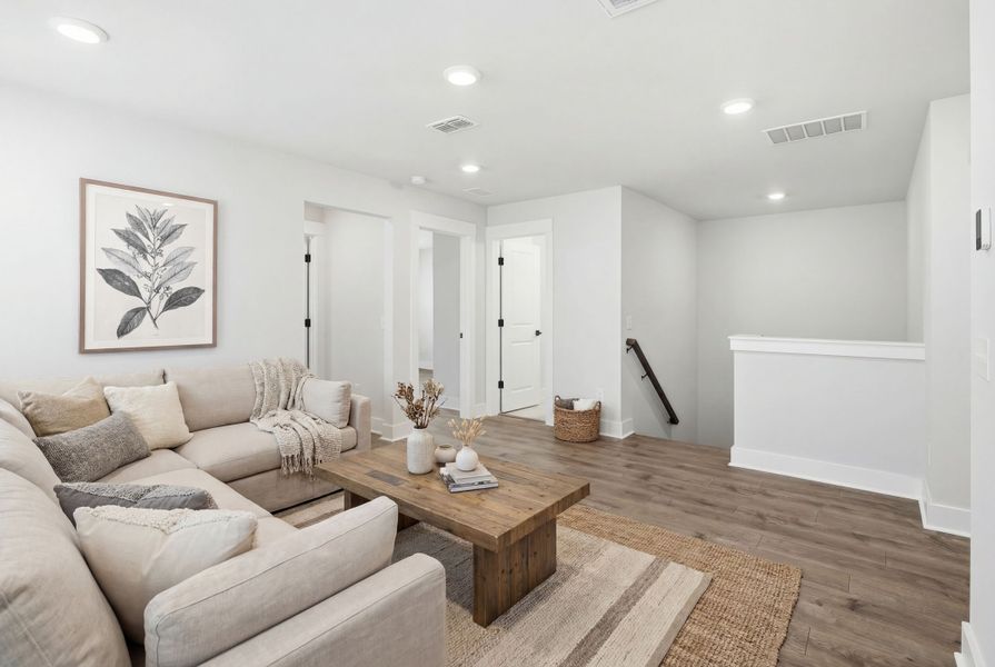 Furnished interior in a model home at Ashley Walk Townes in Charleston (Image 7).