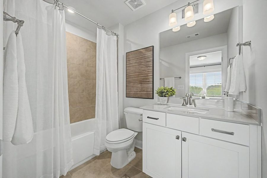 Furnished interior in a model home at The Estates at Hurricane Pointe in Douglasville (Image 35).