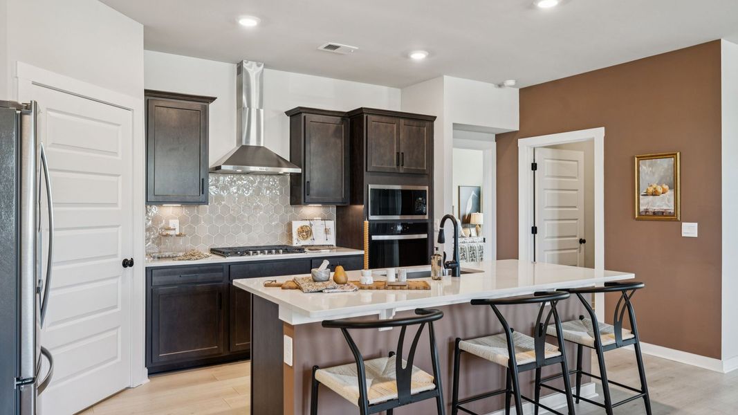 Furnished interior in a model home at Harvest Point in Spring Hill (Image 54).