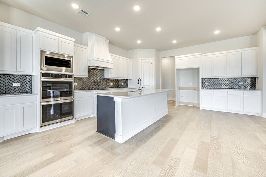 Furnished interior in a model home at Coppenger Place in Godley (Image 29).