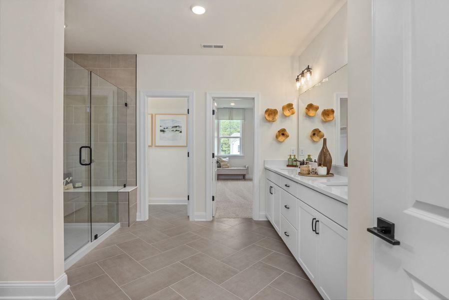 Furnished interior in a model home at Ashland in New Hill (Image 28).