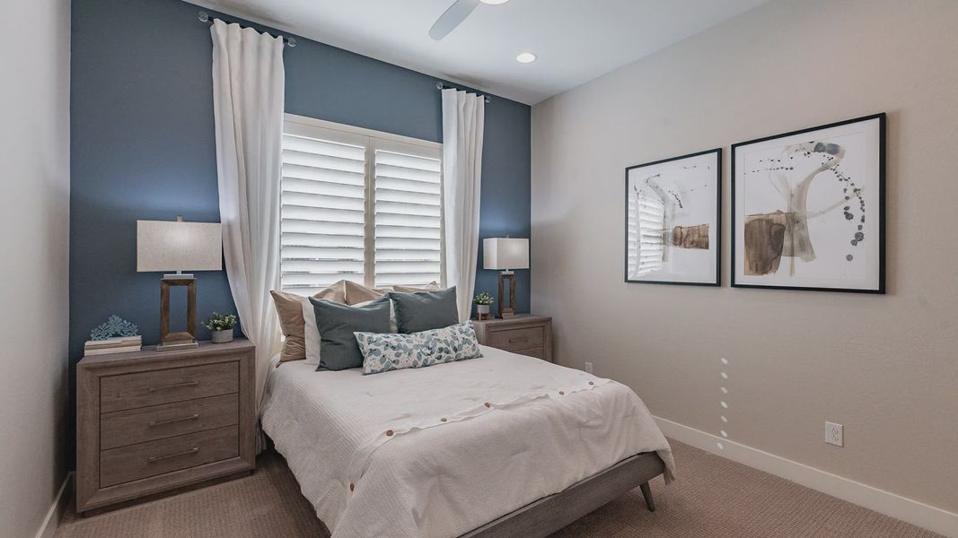 Experience luxury with a chic blue accent wall, elegant lighting, and exquisite decor in Arroyo Seco Hacienda. Experience luxury with a chic blue accent wall, elegant lighting, and exquisite decor in Arroyo Seco Hacienda.