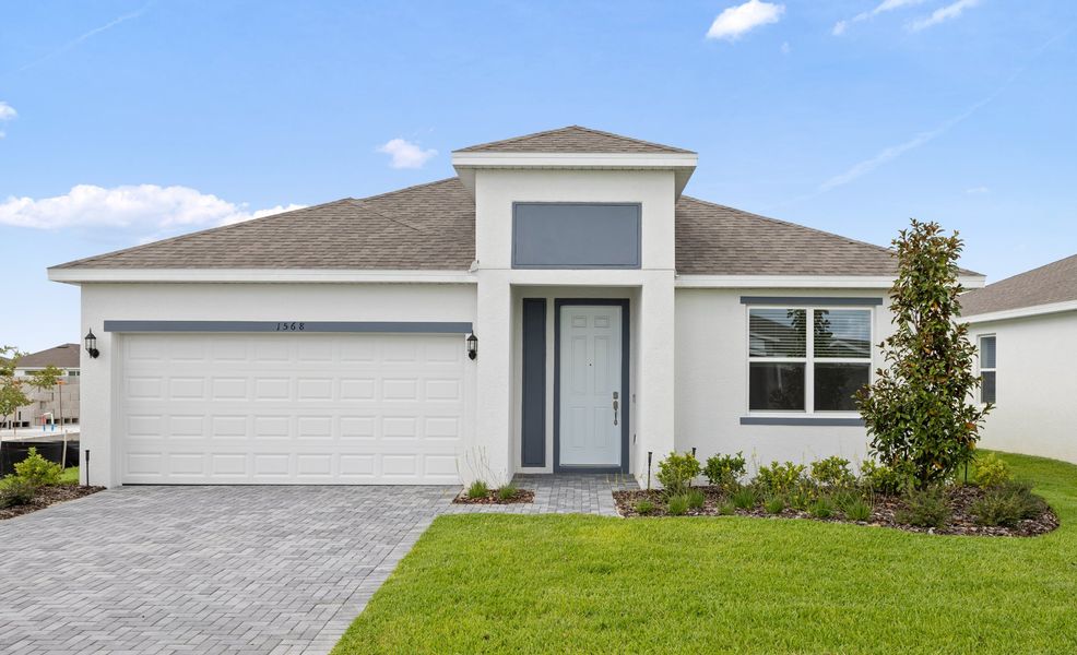 Front exterior of a home in the Tarpon Bay community, located in Haines City, FL (Image 3).