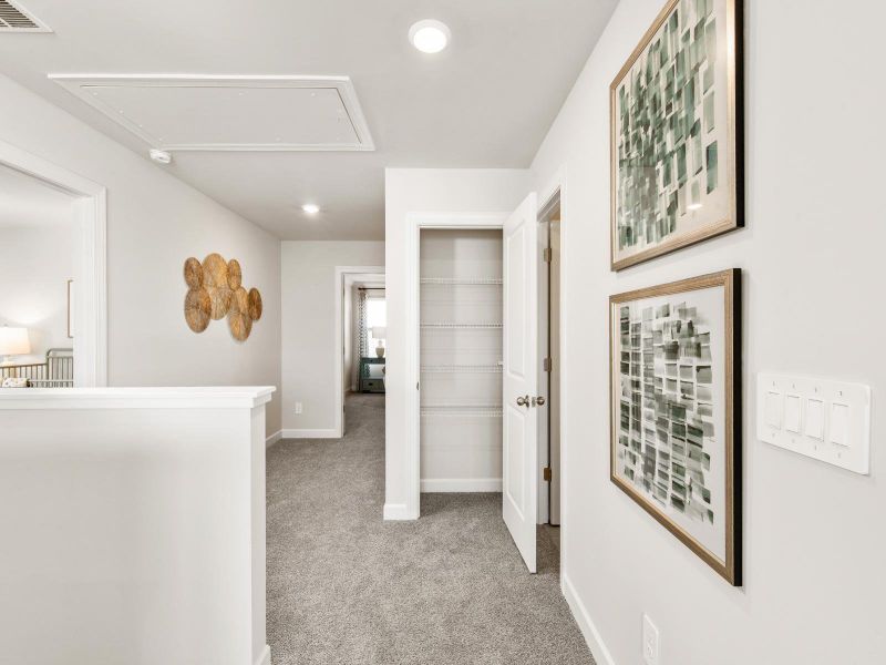 Furnished interior in a model home at Russell Grove - Rolling Hills Series in Charlotte (Image 7).