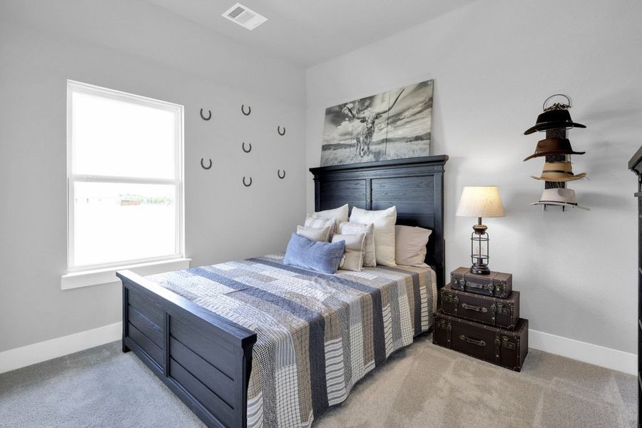Furnished interior in a model home at Polo Ridge in Forney (Image 21).