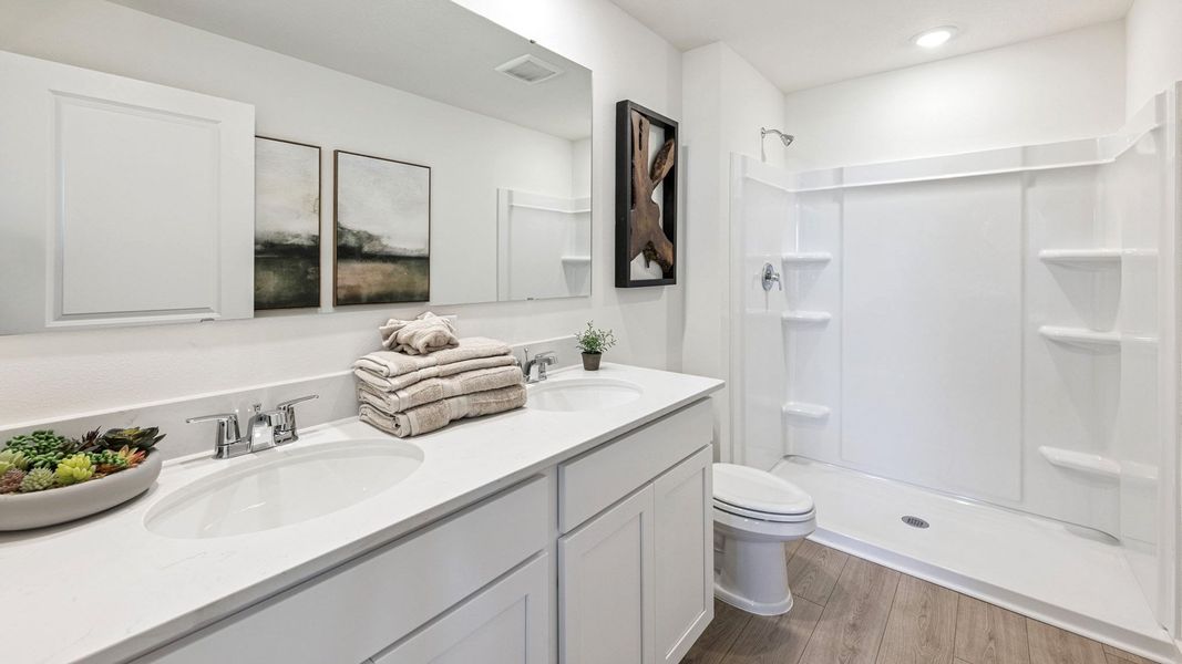 Furnished interior in a model home at Vineland Reserve in Osteen (Image 16).