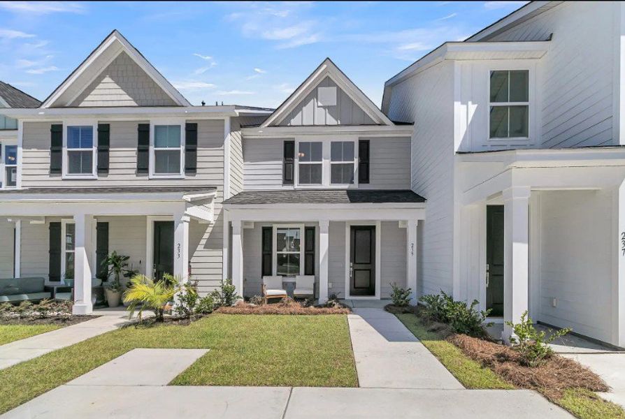 Front exterior of a home in the Abbey Walk Townhomes community, located in Moncks Corner, SC (Image 2).