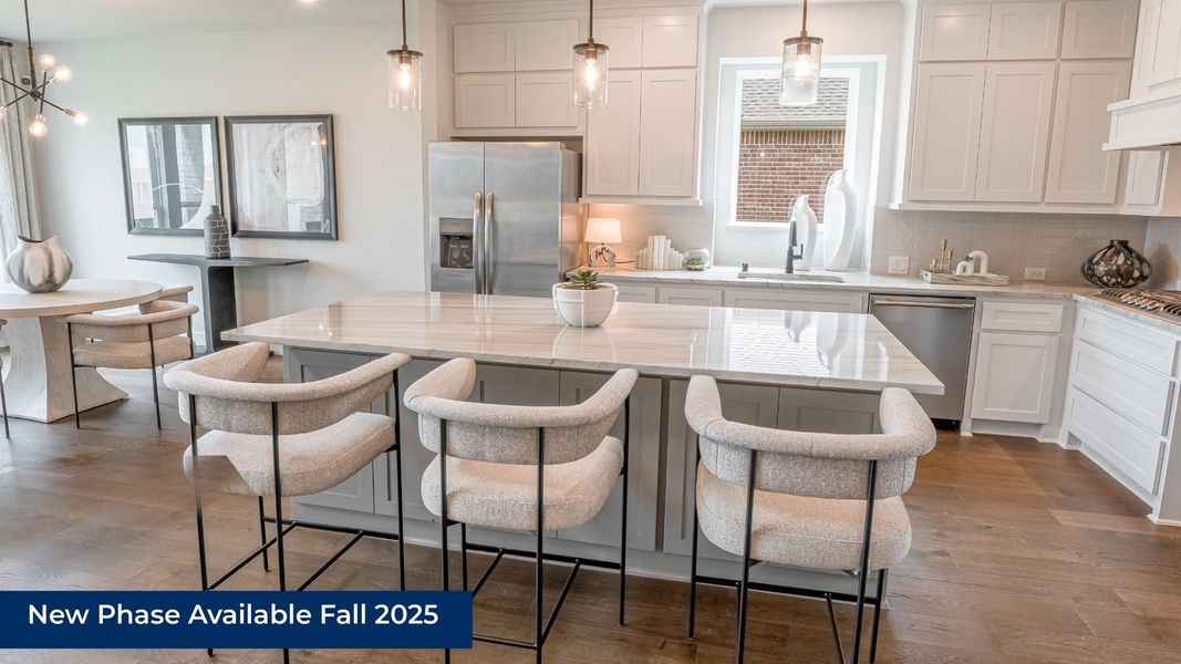 Furnished interior in a model home at Spiritas Ranch in Little Elm (Image 2).