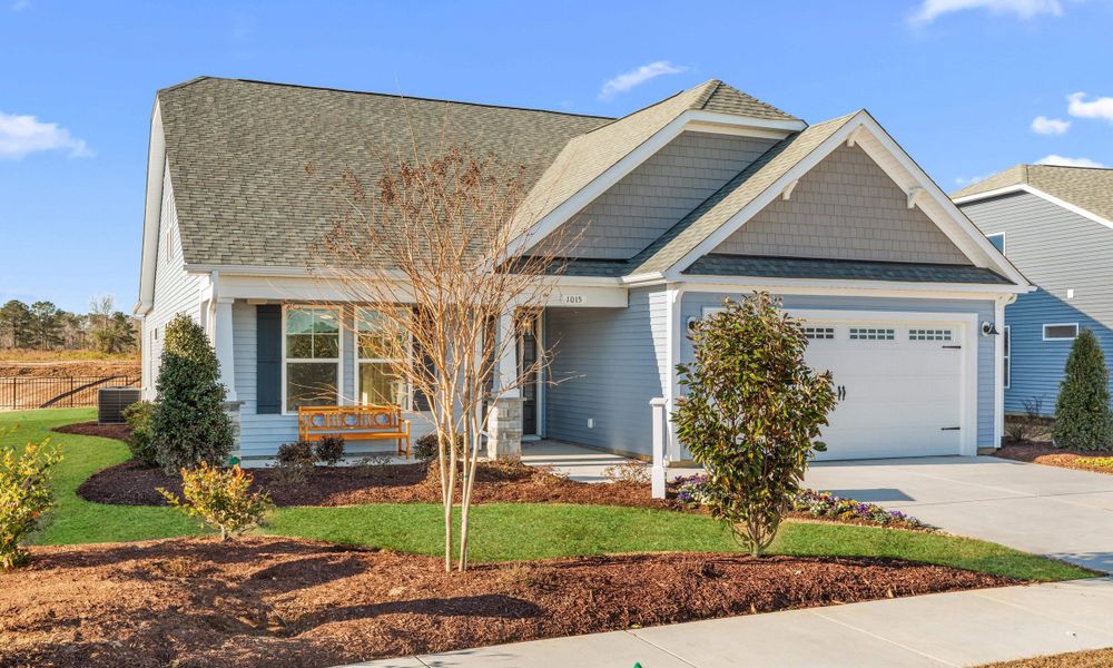 Front exterior of a home in the Bridgewater - Shorehaven Village community, located in Little River, SC (Image 13).