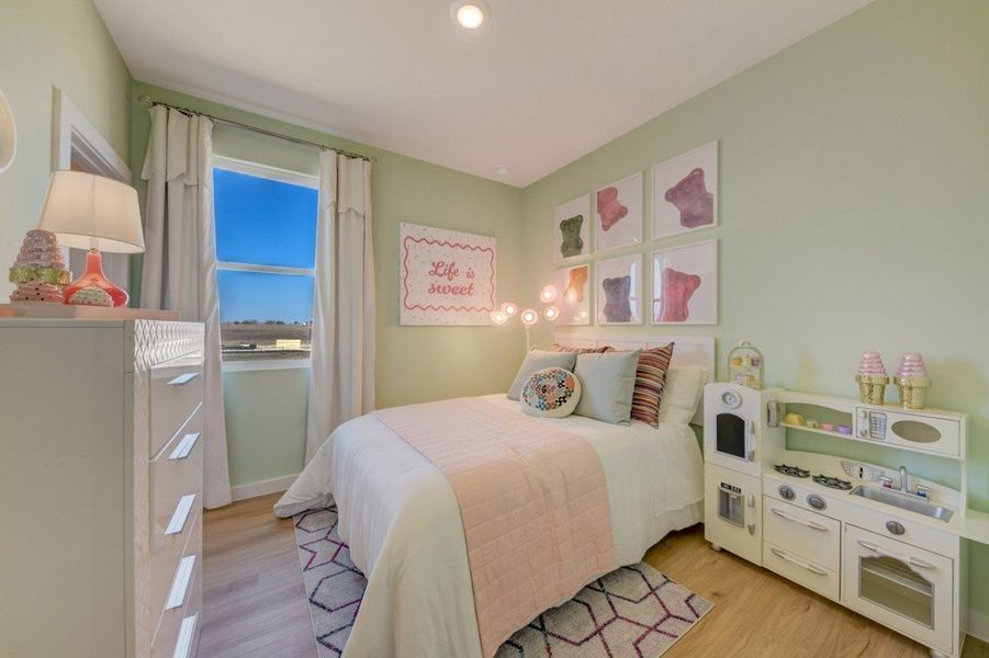 Furnished interior in a model home at Highland Ridge in New Braunfels (Image 36).