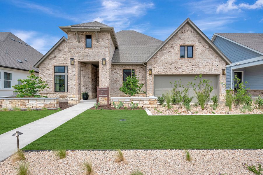 Front exterior of a home in the Kissing Tree – Summit Series community, located in San Marcos, TX (Image 4).